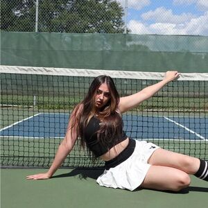 White and black Playboy tennis skirt